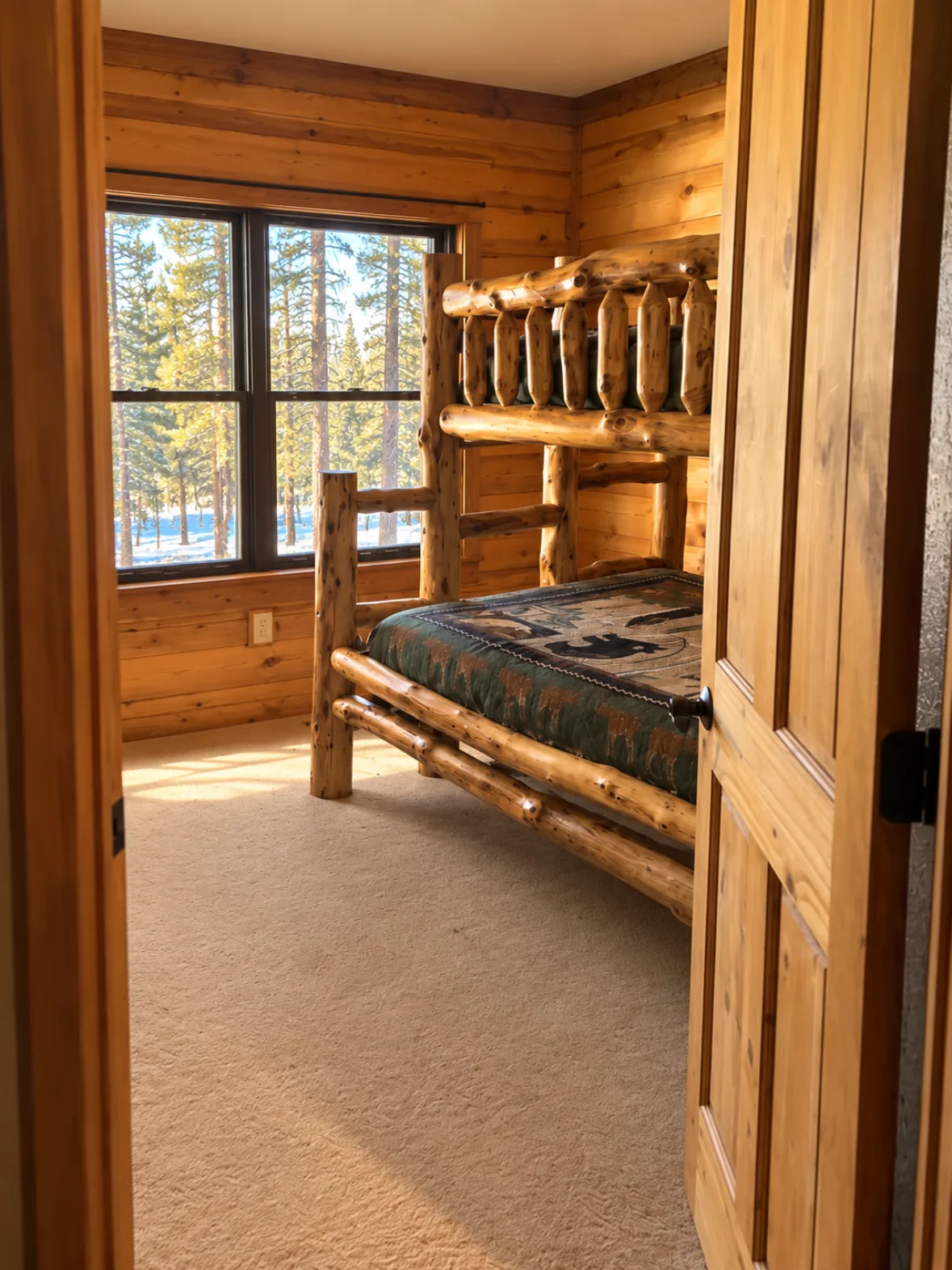 Log bunk room with a twin-over-full bunk bed