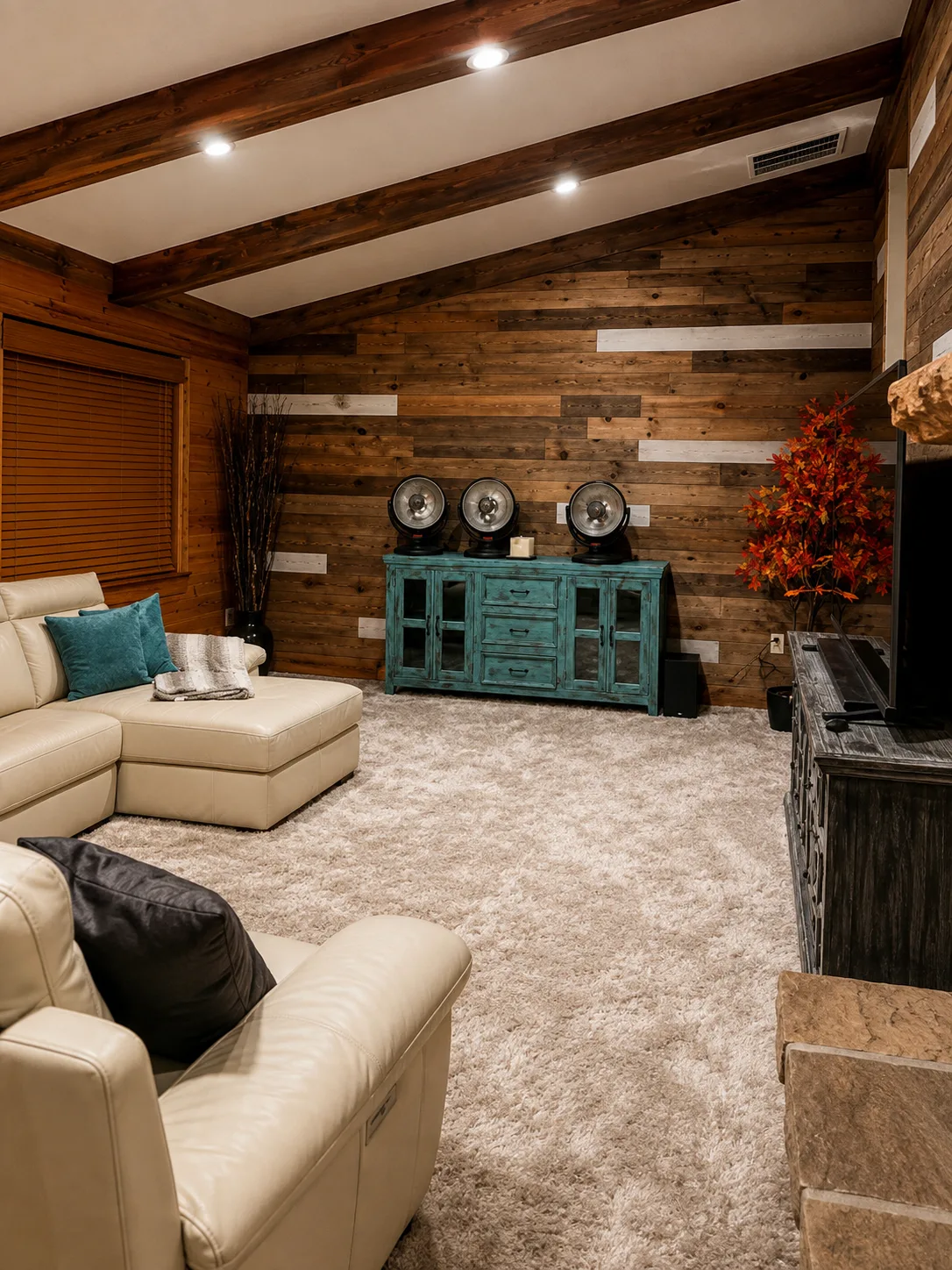 Living room with sectional and reclaimed wood wall
